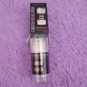 Revolution Brow Block Glue with Black and Gold Packaging